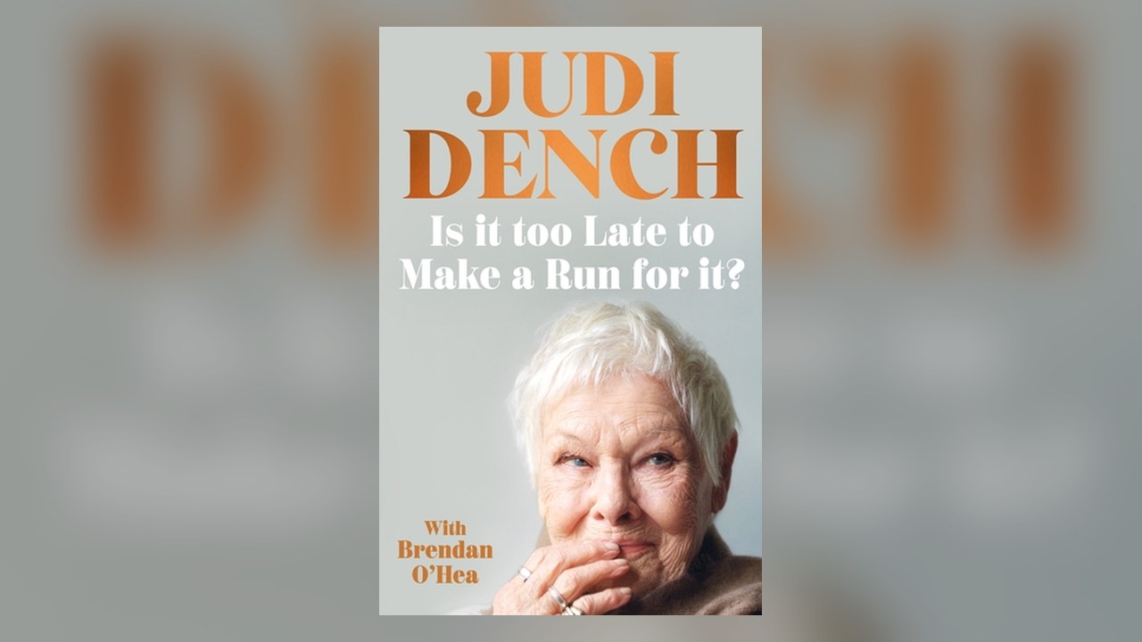 Cover of Judi Dench's memoir, Is It Too Late to Make a Run for It?, with a portrait of the white-haired actor, set on a blurred background